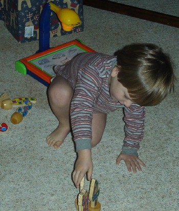photo of Alex setting up the number bowling pins