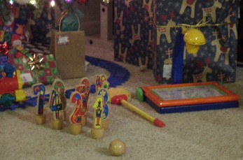 photo of the presents by the tree
